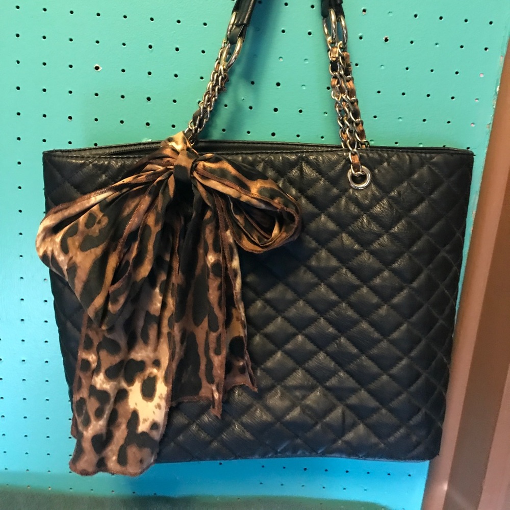Aldo shoulder bag with cheetah scarf.